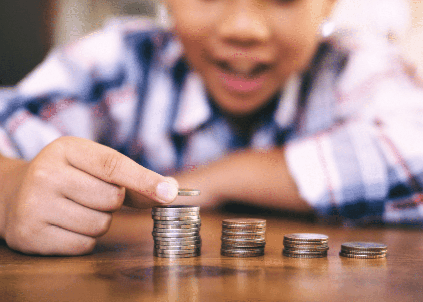 Child stacking coins